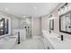 This bathroom features a soaking tub, glass-enclosed shower, and double sink vanity with modern fixtures at 3017 Lana Ln, Marietta, GA 30066