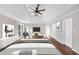Stylized bedroom with a king-size bed and wood floors at 3017 Lana Ln, Marietta, GA 30066