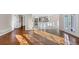 Open-concept living and kitchen area with hardwood floors and lots of light at 3017 Lana Ln, Marietta, GA 30066