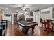 Finished basement with a pool table, bar area, and recessed lighting for an entertaining atmosphere at 3480 Arbroath Dr, Douglasville, GA 30135