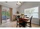Cozy breakfast nook with sliding door access to the outdoor deck at 3480 Arbroath Dr, Douglasville, GA 30135