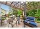Outdoor deck area, perfect for entertaining with ample seating and wooded view at 3480 Arbroath Dr, Douglasville, GA 30135