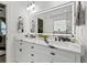 Elegant main bathroom featuring double vanity, marble countertop, and modern fixtures at 3480 Arbroath Dr, Douglasville, GA 30135