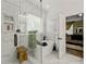 Bright main bathroom featuring soaking tub, marble floors, and glass shower at 3480 Arbroath Dr, Douglasville, GA 30135