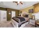 Serene main bedroom features a tray ceiling, neutral colors, and ensuite at 3480 Arbroath Dr, Douglasville, GA 30135