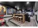 Movie theater room boasts a large screen, cozy seating, and concession area, perfect for entertainment at 3480 Arbroath Dr, Douglasville, GA 30135