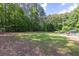 Expansive backyard with lush green lawn, perfect for recreation at 3865 Pointer Rd, Loganville, GA 30052