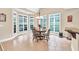 Cozy breakfast nook with large windows and views of the backyard at 3865 Pointer Rd, Loganville, GA 30052