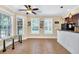 Bright breakfast nook featuring natural light, tile floors, and stylish fixtures at 3865 Pointer Rd, Loganville, GA 30052