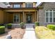 Charming home with stone accents, manicured lawn, and inviting covered front porch and walkway at 3865 Pointer Rd, Loganville, GA 30052