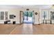 Open floor plan leading to a patio and in-ground swimming pool at 3865 Pointer Rd, Loganville, GA 30052