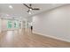 Large finished basement with wood-look floors, recessed lights, and multiple windows at 4815 Westgate Drive, Cumming, GA 30040