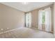 Cozy bedroom filled with natural light, carpet floors and neutral paint at 4815 Westgate Drive, Cumming, GA 30040