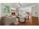 Bright and airy living room with a fireplace and hardwood floors at 4815 Westgate Drive, Cumming, GA 30040