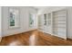 Bright study room with built-in bookshelves and natural light from large windows at 4815 Westgate Drive, Cumming, GA 30040