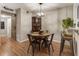 Cozy dining room with a rustic table, stylish light fixture, and warm ambiance at 504 River Run Dr, Atlanta, GA 30350