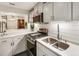 Bright kitchen offering stainless steel appliances and gas cooktop at 504 River Run Dr, Atlanta, GA 30350