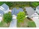 Lovely single-Gathering home with a well-maintained lawn, mature trees, and a paved driveway at 5251 Centennial Hill Nw Dr, Acworth, GA 30102