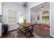 Breakfast nook with modern lighting and views to the sunroom at 5251 Centennial Hill Nw Dr, Acworth, GA 30102