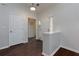 Bright foyer with dark wood floors and neutral wall color at 5251 Centennial Hill Nw Dr, Acworth, GA 30102