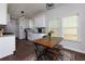 Eat-in kitchen with modern appliances and hardwood floors at 5251 Centennial Hill Nw Dr, Acworth, GA 30102
