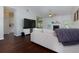 Open-concept living room with neutral walls, dark floors and backyard view at 5251 Centennial Hill Nw Dr, Acworth, GA 30102