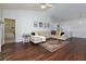 Spacious living room with hardwood floors and ample natural light at 5251 Centennial Hill Nw Dr, Acworth, GA 30102
