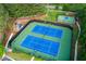 Aerial view of tennis and basketball courts, plus a playground area, offering various recreational opportunities in this community at 5251 Centennial Hill Nw Dr, Acworth, GA 30102
