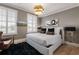 Comfortable bedroom with a plush rug, modern furniture, and plenty of natural light at 58 Canton St # 410, Alpharetta, GA 30009