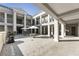 Attractive courtyard featuring outdoor seating, a grill, and manicured landscaping at 58 Canton St # 410, Alpharetta, GA 30009