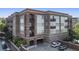 Beautiful brick apartment building with balconies and easy-access parking at 58 Canton St # 410, Alpharetta, GA 30009