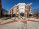 Attractive mixed-use building with retail storefronts and apartments above, centered around a fountain at 58 Canton St # 410, Alpharetta, GA 30009