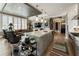 Bright, open-concept kitchen features a large island and stainless steel appliances at 58 Canton St # 410, Alpharetta, GA 30009