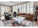 Cozy living room with a comfortable seating area and lots of natural light at 58 Canton St # 410, Alpharetta, GA 30009