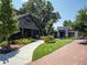 Street view of the shops, including Holmes and Citizen Soul, on a bright day at 58 Canton St # 410, Alpharetta, GA 30009