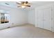 Bright bedroom with carpeted floors and a window at 2910 Waverly Place Dr, Dacula, GA 30019