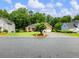 Single-story brick home with a manicured lawn and a two-car garage at 2910 Waverly Place Dr, Dacula, GA 30019