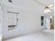 Spacious main bedroom with a tray ceiling, ceiling fan, and neutral carpeting at 2910 Waverly Place Dr, Dacula, GA 30019