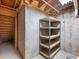 Unfinished basement with exposed beams, cement walls and metal shelving at 2910 Waverly Place Dr, Dacula, GA 30019