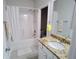 Bright bathroom with tub-shower combo and granite countertop for a stylish and functional space at 3943 Ridge Grove Way, Suwanee, GA 30024