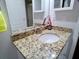 Bathroom featuring granite countertop and white cabinetry, combining elegance and practicality at 3943 Ridge Grove Way, Suwanee, GA 30024