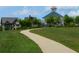 Scenic view of a gazebo, sidewalk, and landscaped area, showcasing the neighborhood at 3943 Ridge Grove Way, Suwanee, GA 30024