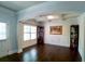 Dining room features hardwood floors, large window, and decorative molding at 3943 Ridge Grove Way, Suwanee, GA 30024