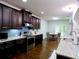 Gourmet kitchen boasts stainless steel appliances, granite counters, and ample cabinet space at 3943 Ridge Grove Way, Suwanee, GA 30024
