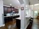 Modern kitchen featuring dark cabinets, stainless steel appliances, and granite countertops at 3943 Ridge Grove Way, Suwanee, GA 30024