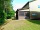 Cozy screened-in porch with outdoor seating, perfect for enjoying the peaceful backyard at 3943 Ridge Grove Way, Suwanee, GA 30024