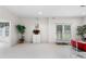 Spacious finished basement has neutral walls, plush carpeting, patio access and allows for flexible use of space at 535 Sugar Gate Ct, Lawrenceville, GA 30044