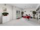Spacious finished basement has neutral walls, plush carpeting, patio access and allows for flexible use of space at 535 Sugar Gate Ct, Lawrenceville, GA 30044