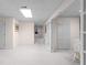 Large finished basement features neutral walls, plush carpeting, and closet storage for convenient organization at 535 Sugar Gate Ct, Lawrenceville, GA 30044