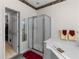 Bathroom with a corner shower and garden tub at 535 Sugar Gate Ct, Lawrenceville, GA 30044